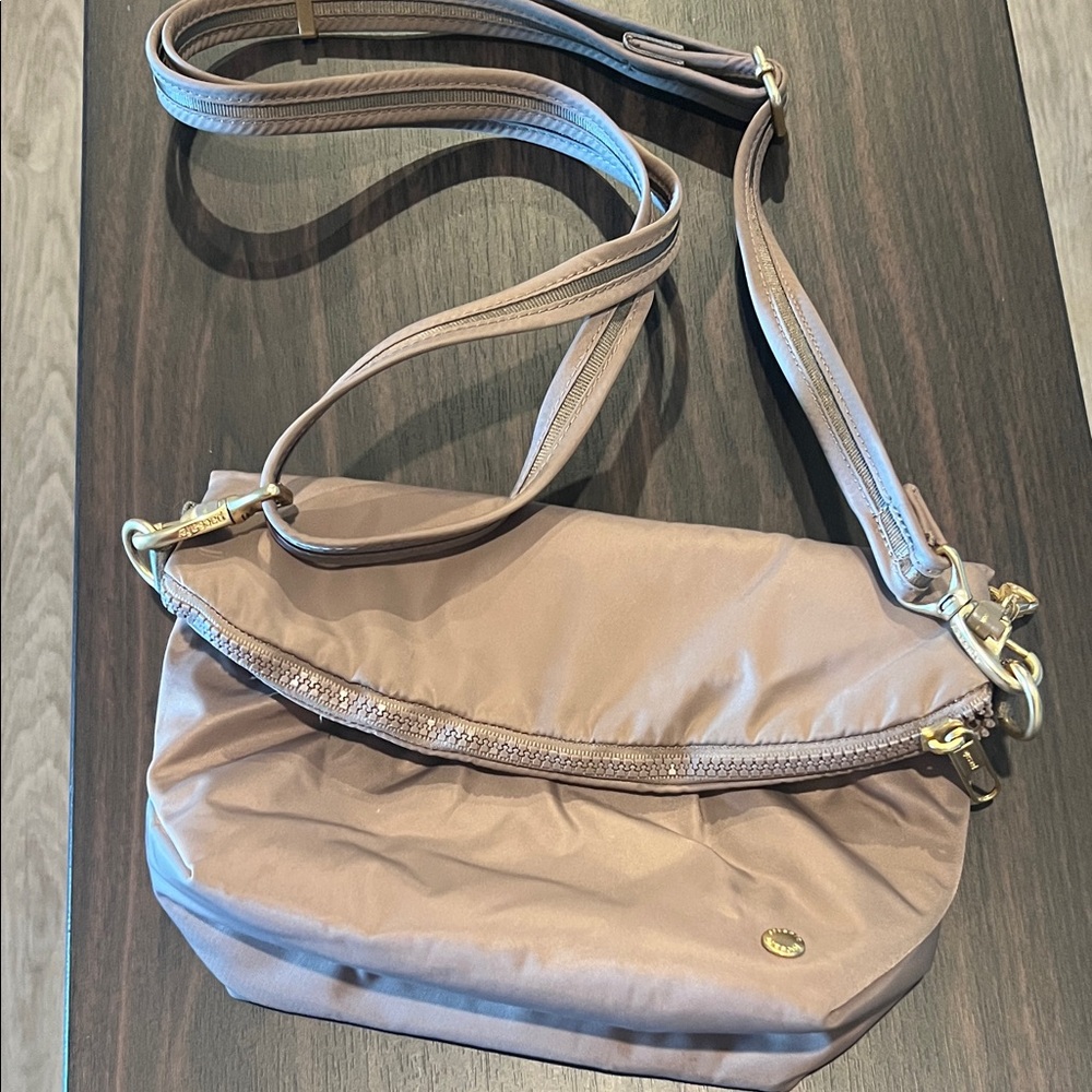 Pacsafe Taupe Crossbody Bag with Gold Hardware